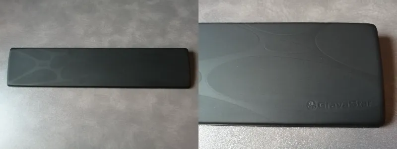 GravaStar専用パームレストの表面。控えめなロゴとスタイリッシュな質感がアップで写っている。